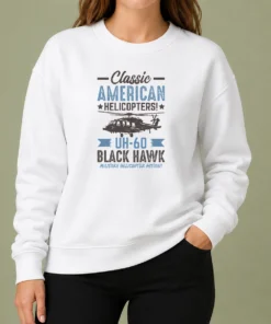 Top Classic American UH 60 Black Hawk Helicopter Sweater in black, featuring detailed helicopter graphic on front