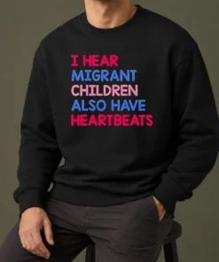 Top Nice I Hear Migrant Children Also Have Heartbeats Sweater in dark color, long sleeves, crew neck