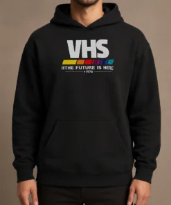 Top Pretty VHS The Future Is Here Hoodie in black, featuring a retro VHS tape graphic on the front